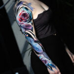 A blue snake sleeve with roses